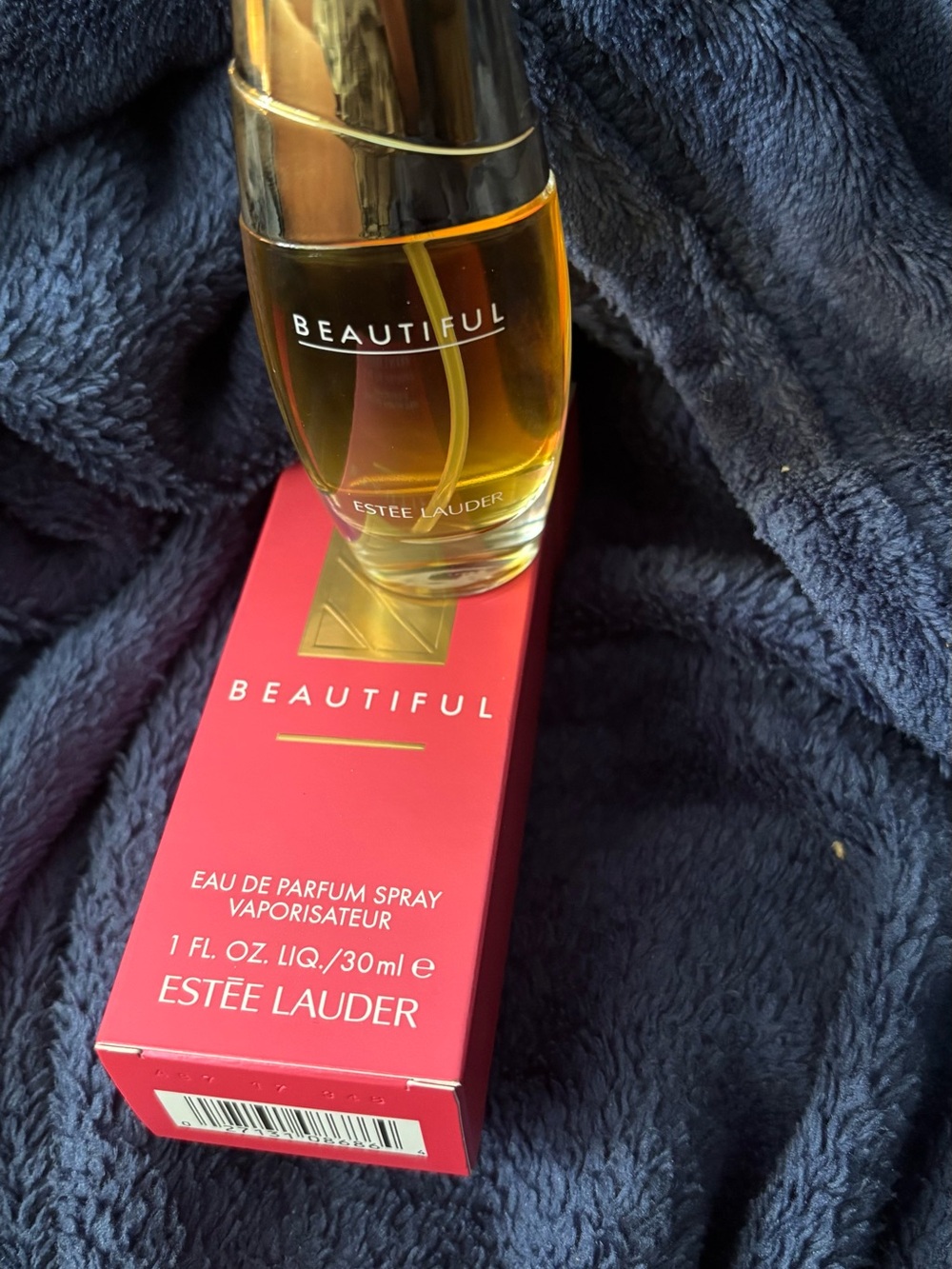 1 oz Estee Lauder Beautiful  - bought at Macys . Never used